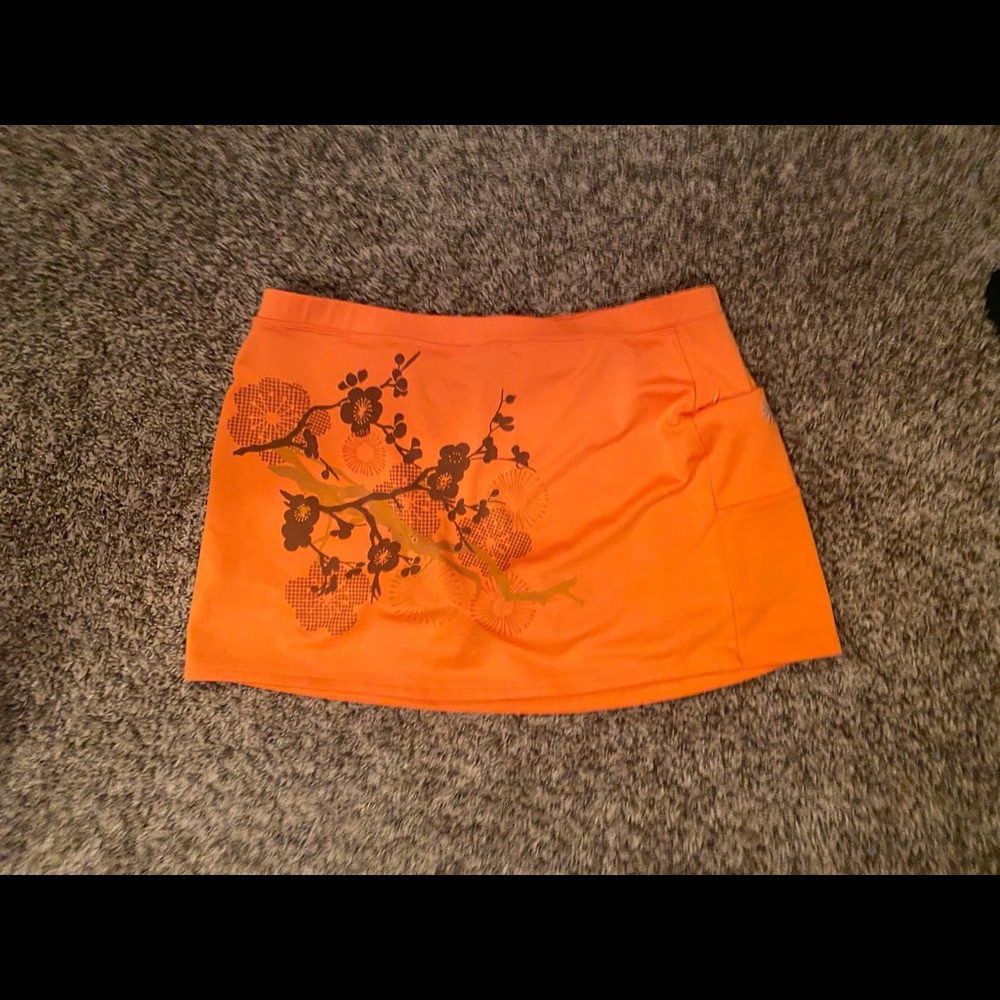 Athleta orange skort. Size M